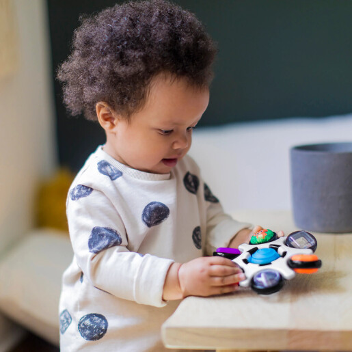 Baby Einstein  - Jucarie senzoriala Curiosity Clutch Twist & Pop Rattle Teether